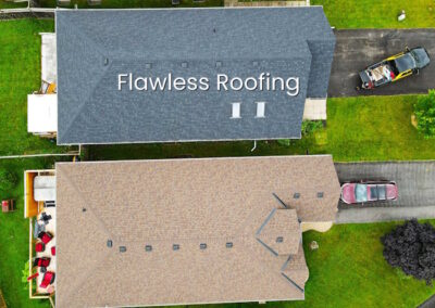 Aerial view grey and beige shingle roof